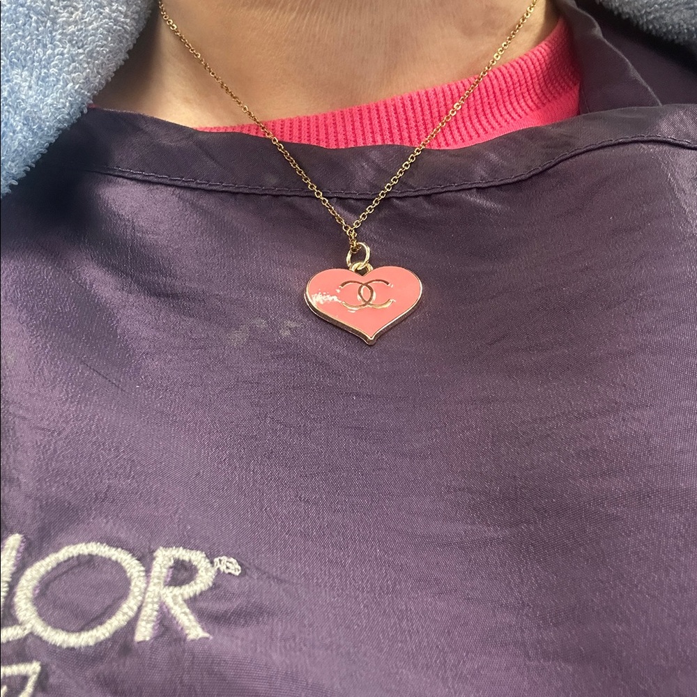 Lovely heart shaped zipper pull charm. Stamped on the back! Chain not included.